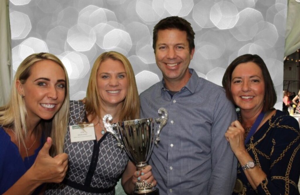 TiER1's Denver team accepts a Best Place to Work award