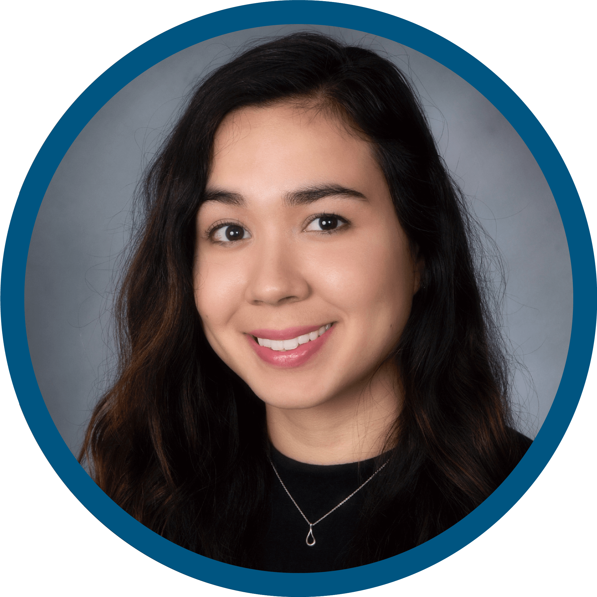 Professional portrait of MichelleO with dark hair, set against a blue circular frame.