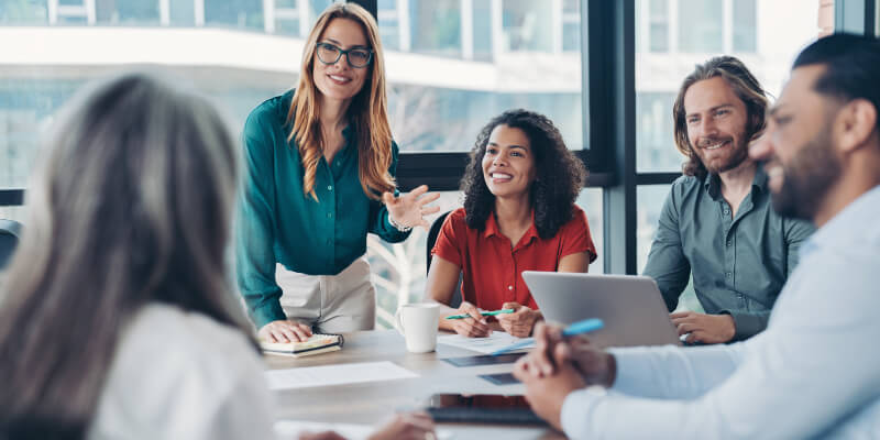 Group of business persons talking in the office