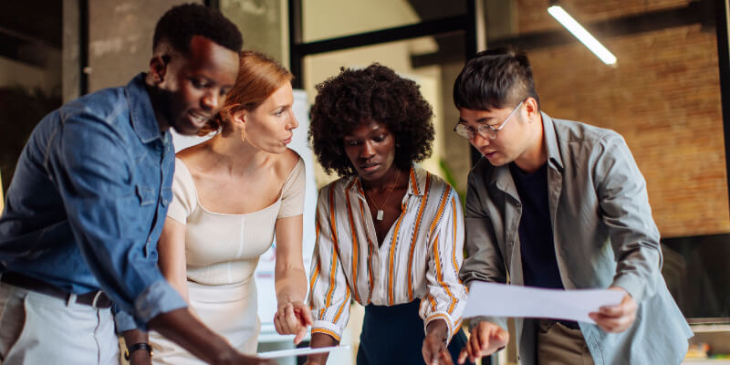 Professionals working together on a shared project.